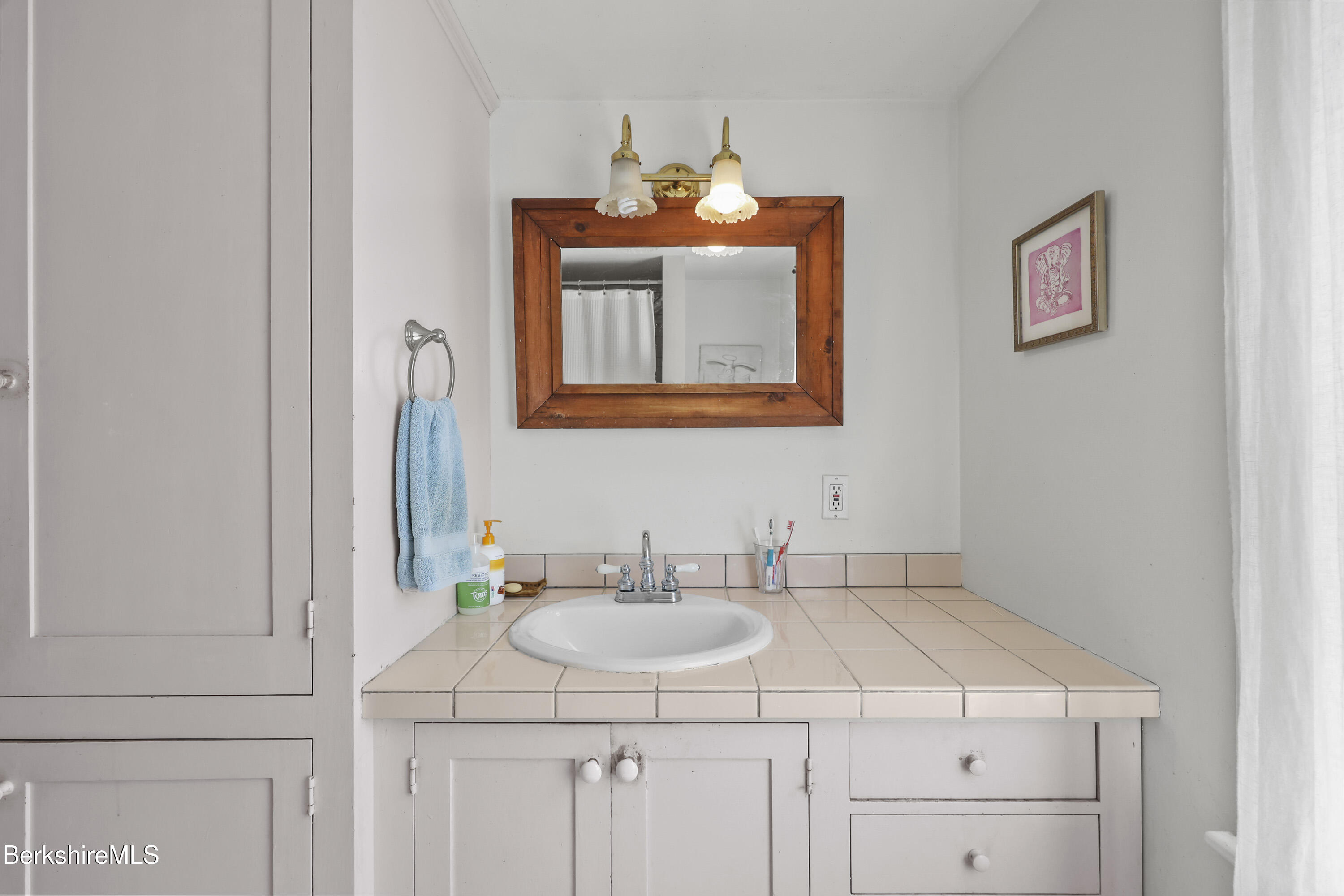 276 Great Barrington Road West Stockbridge, MA 01236 - Photo 36 of 68 a bathroom with a sink and a mirror