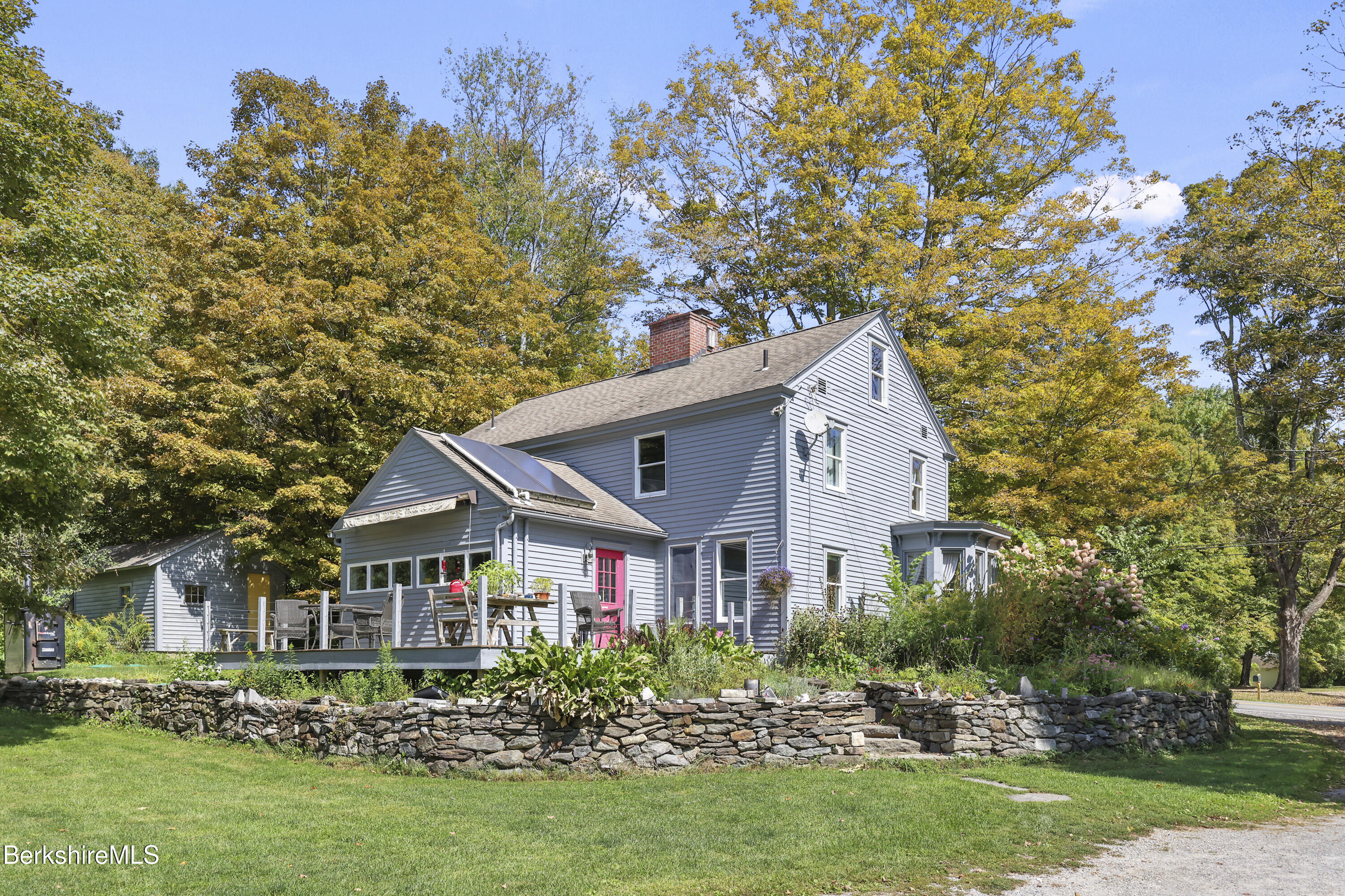 276 Great Barrington Road West Stockbridge, MA 01236 - Photo 50 of 68 a front view of a house with a garden