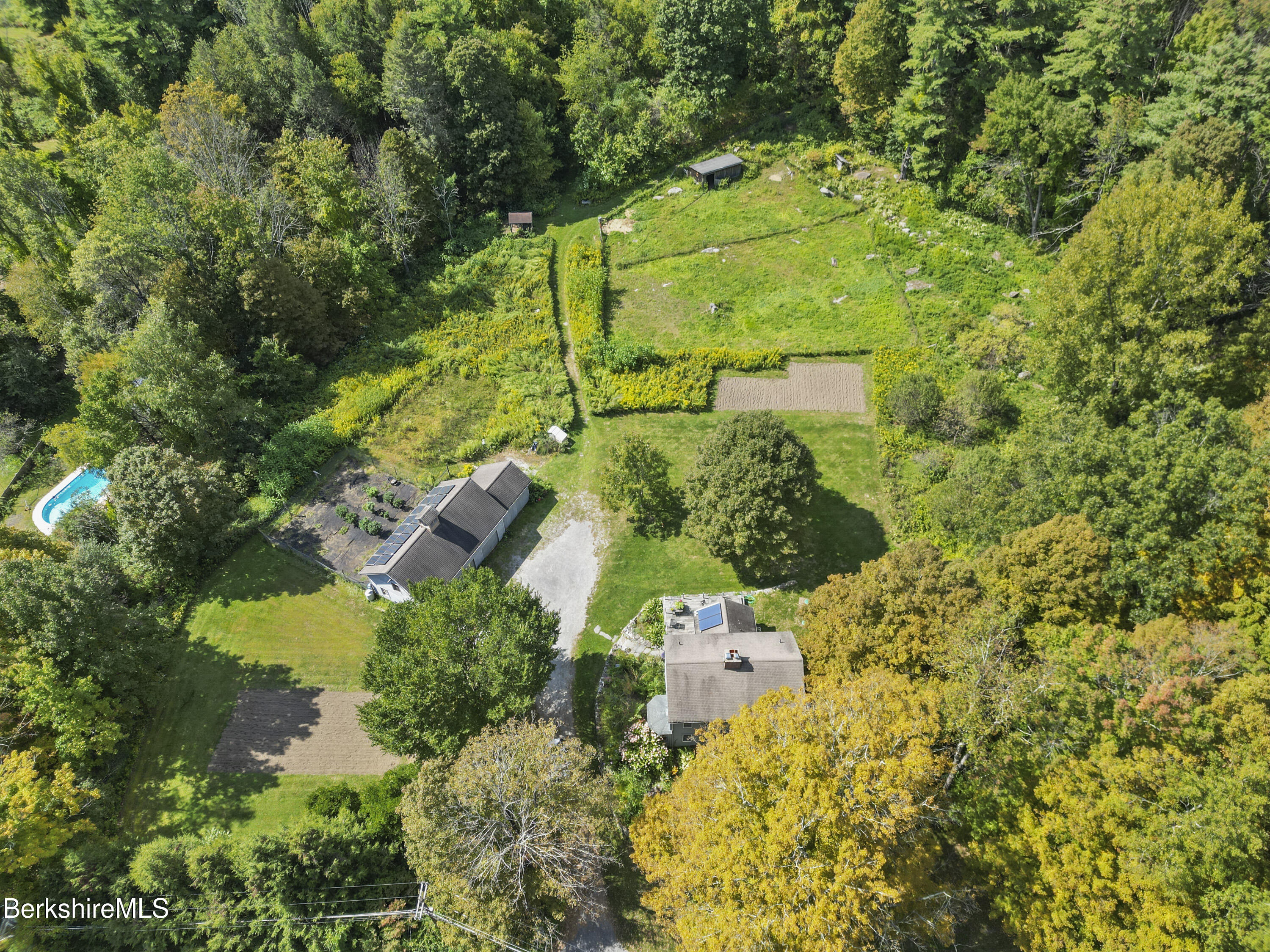 276 Great Barrington Road West Stockbridge, MA 01236 - Photo 60 of 68 an aerial view of residential house with outdoor space and trees all around