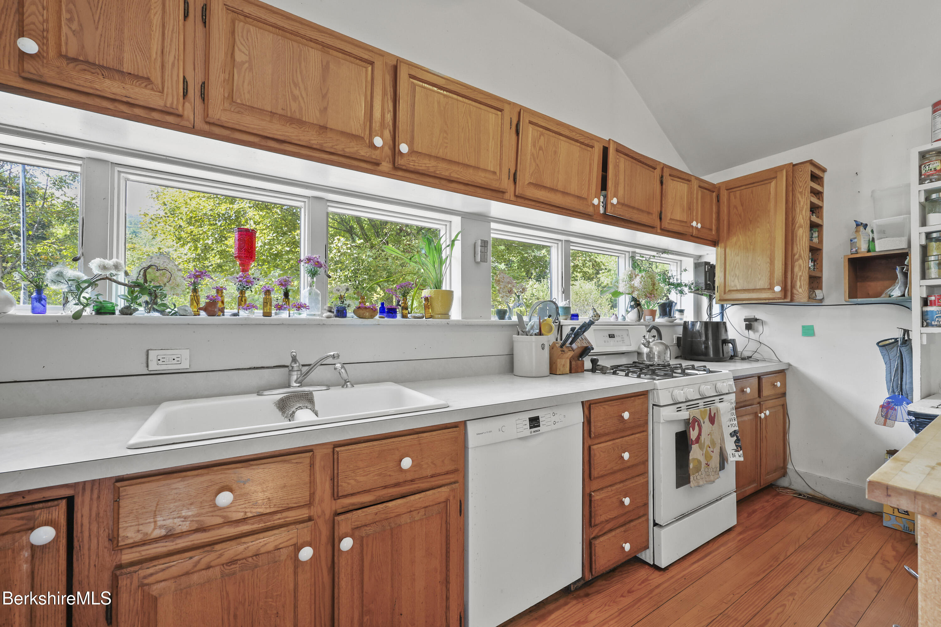 276 Great Barrington Road West Stockbridge, MA 01236 - Photo 7 of 68 a kitchen with stainless steel appliances granite countertop a sink and cabinets