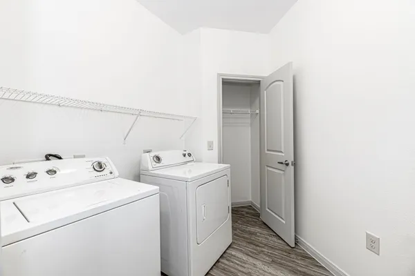 a utility room with dryer and washer