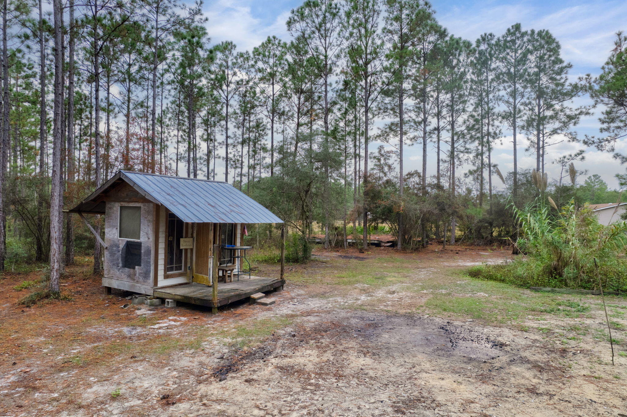 526 Don Graff Road Freeport, FL 32439 - Photo 9 of 20 a view of a house with a yard