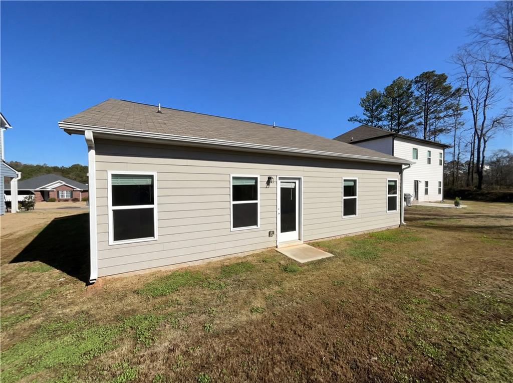2682 North Broad Street Extension Northeast Rome, GA 30161 - Photo 21 of 23 a front view of house with yard