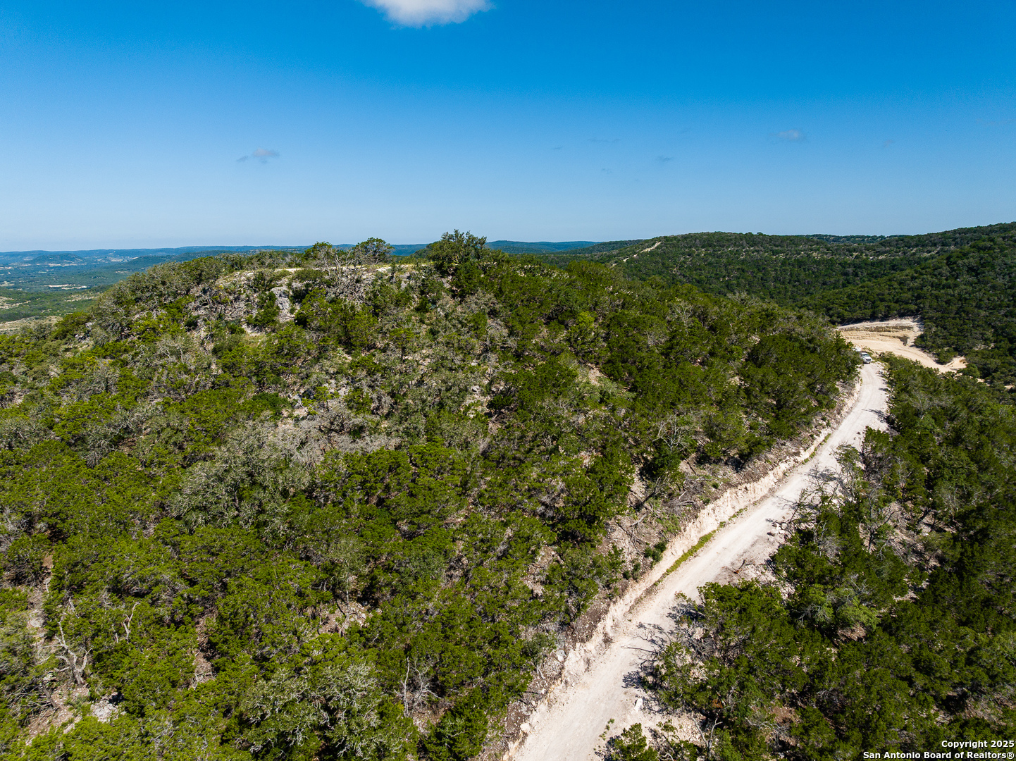 311 Jackson Way Tarpley, TX 78883 - Photo 16 of 47 a view of a city with an ocean