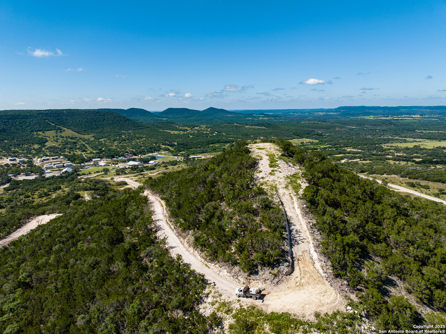 311 Jackson Way Tarpley, TX 78883 - Photo 21 of 47 a view of a city with mountains in the background