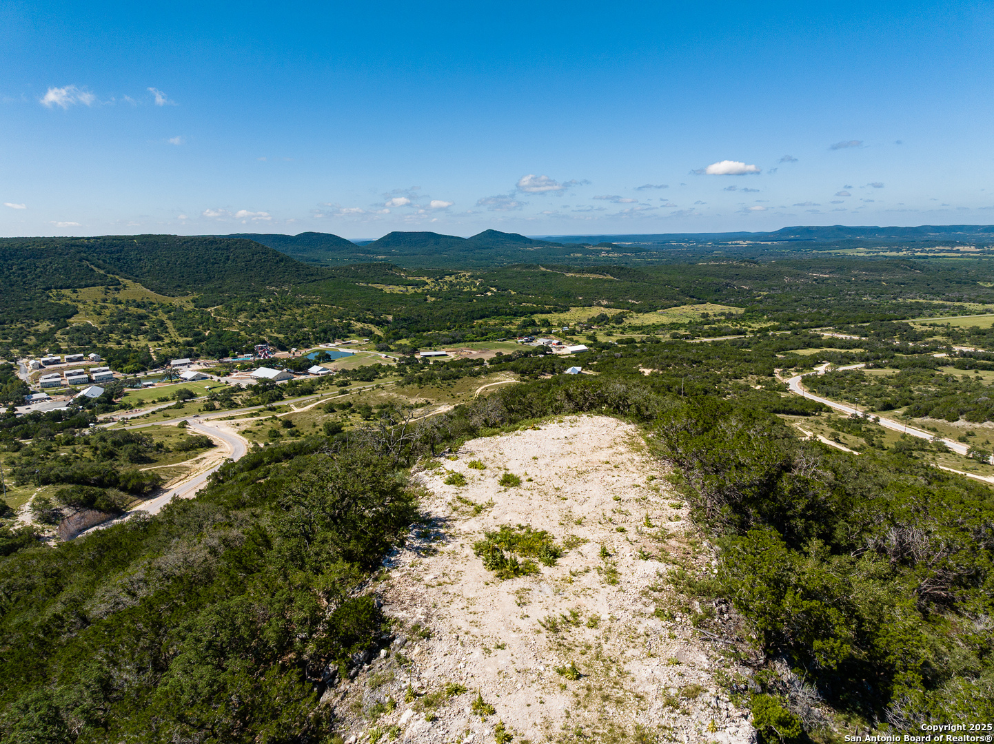 311 Jackson Way Tarpley, TX 78883 - Photo 27 of 47 a view of a lake with a city