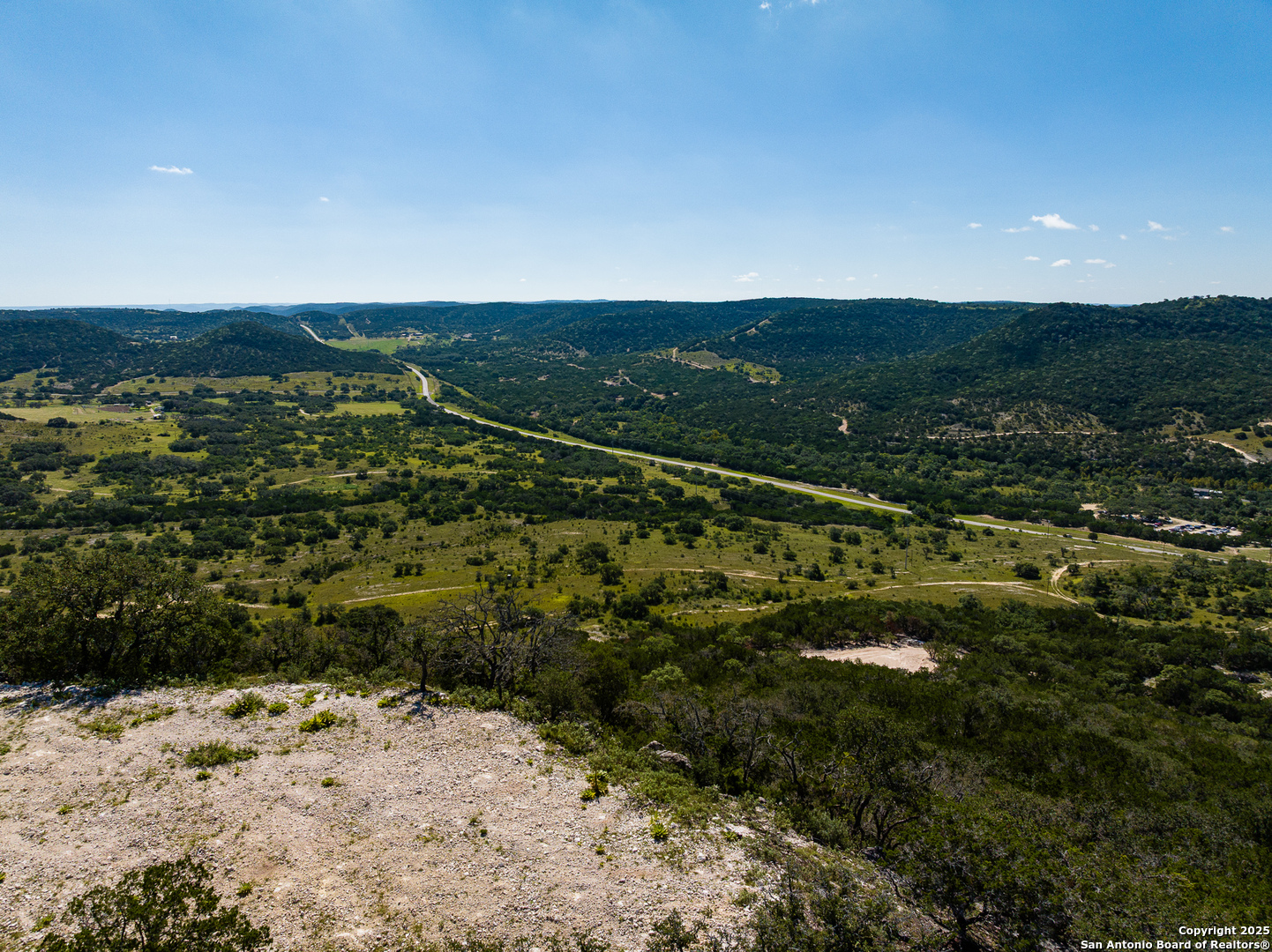 311 Jackson Way Tarpley, TX 78883 - Photo 29 of 47 a view of a field with an ocean
