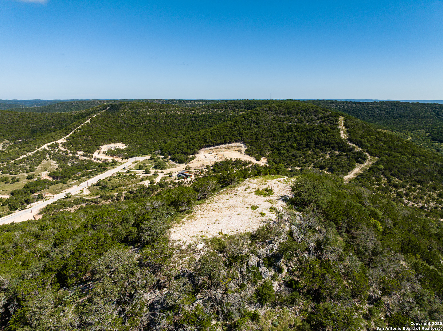 311 Jackson Way Tarpley, TX 78883 - Photo 33 of 47 an aerial view of ocean with residential houses with outdoor space