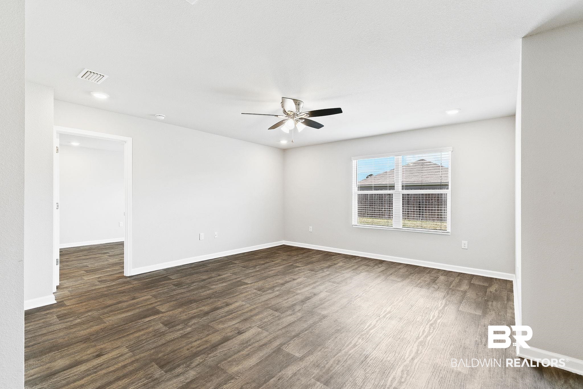 17129 Lanier Boulevard Foley, AL 36535 - Photo 11 of 37 Den/Living Rm