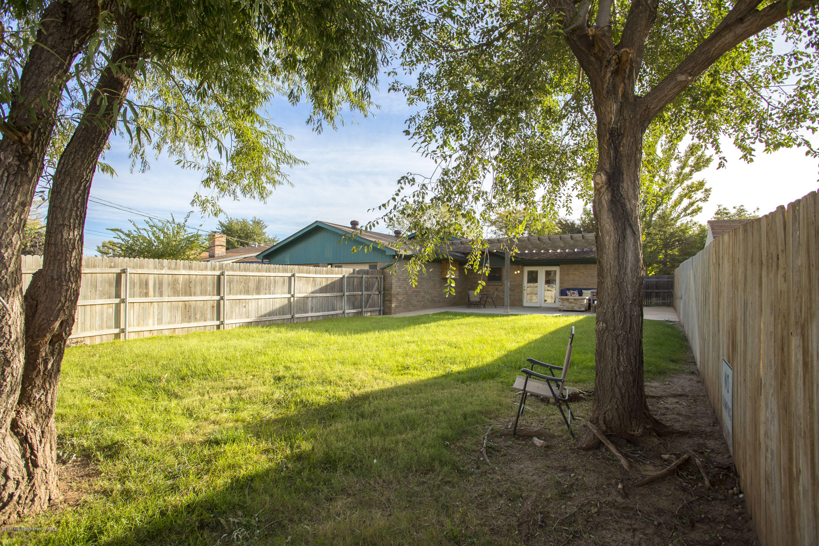8324 Lamount Drive Amarillo, TX 79110 - Photo 22 of 26 a view of a house with a yard balcony and swimming pool
