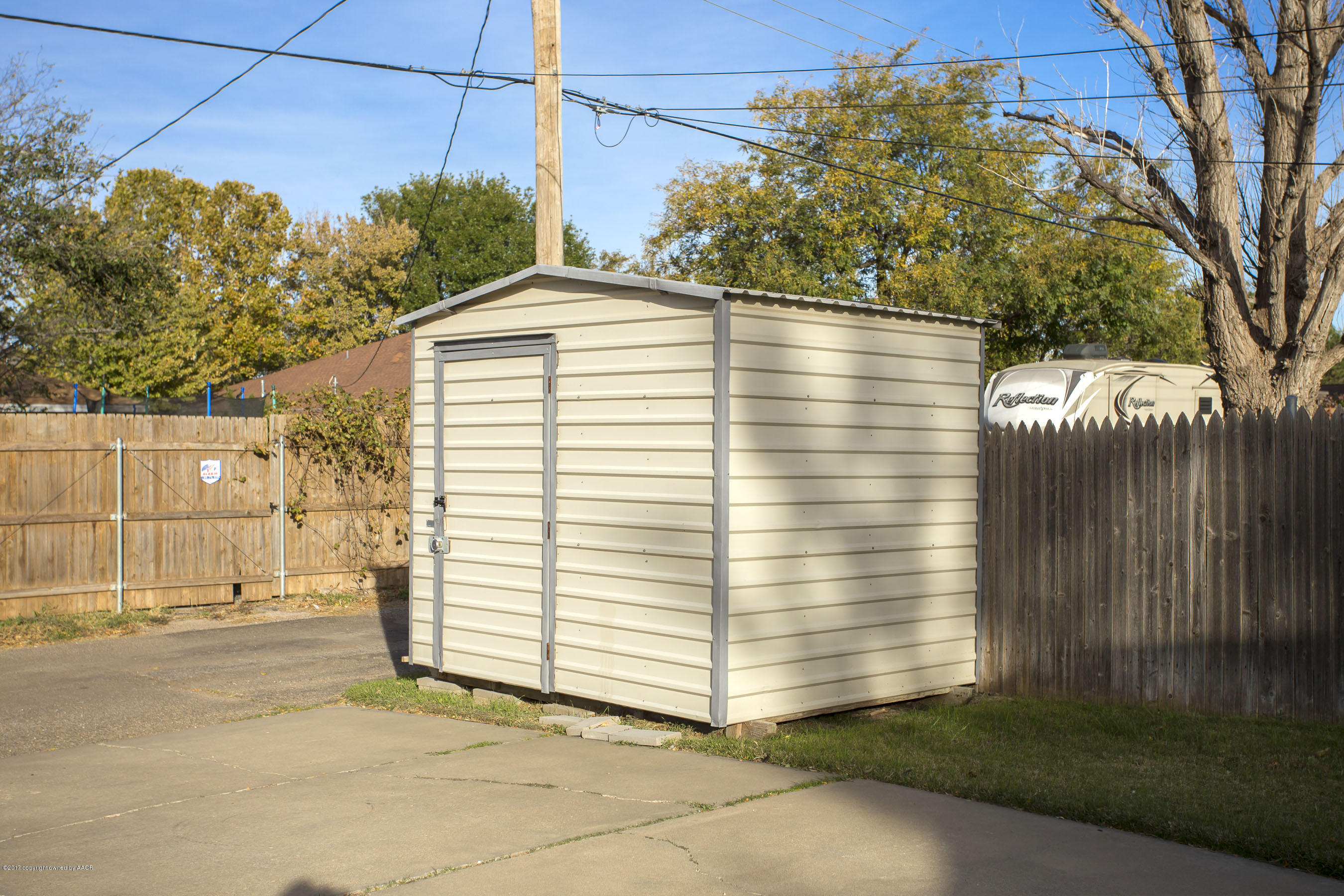 8324 Lamount Drive Amarillo, TX 79110 - Photo 26 of 26 a view of a house with a yard