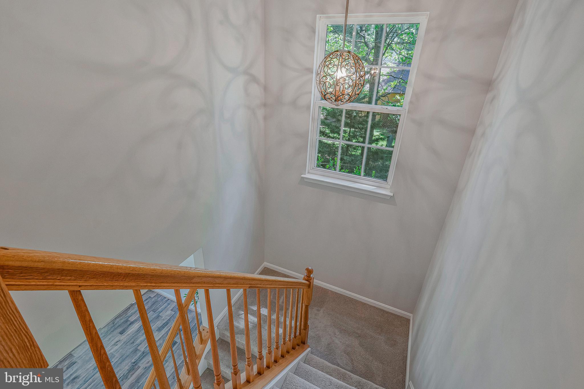 11587 Wollaston Circle Swan Point, MD 20645 - Photo 18 of 55 a view of a balcony with wooden floor