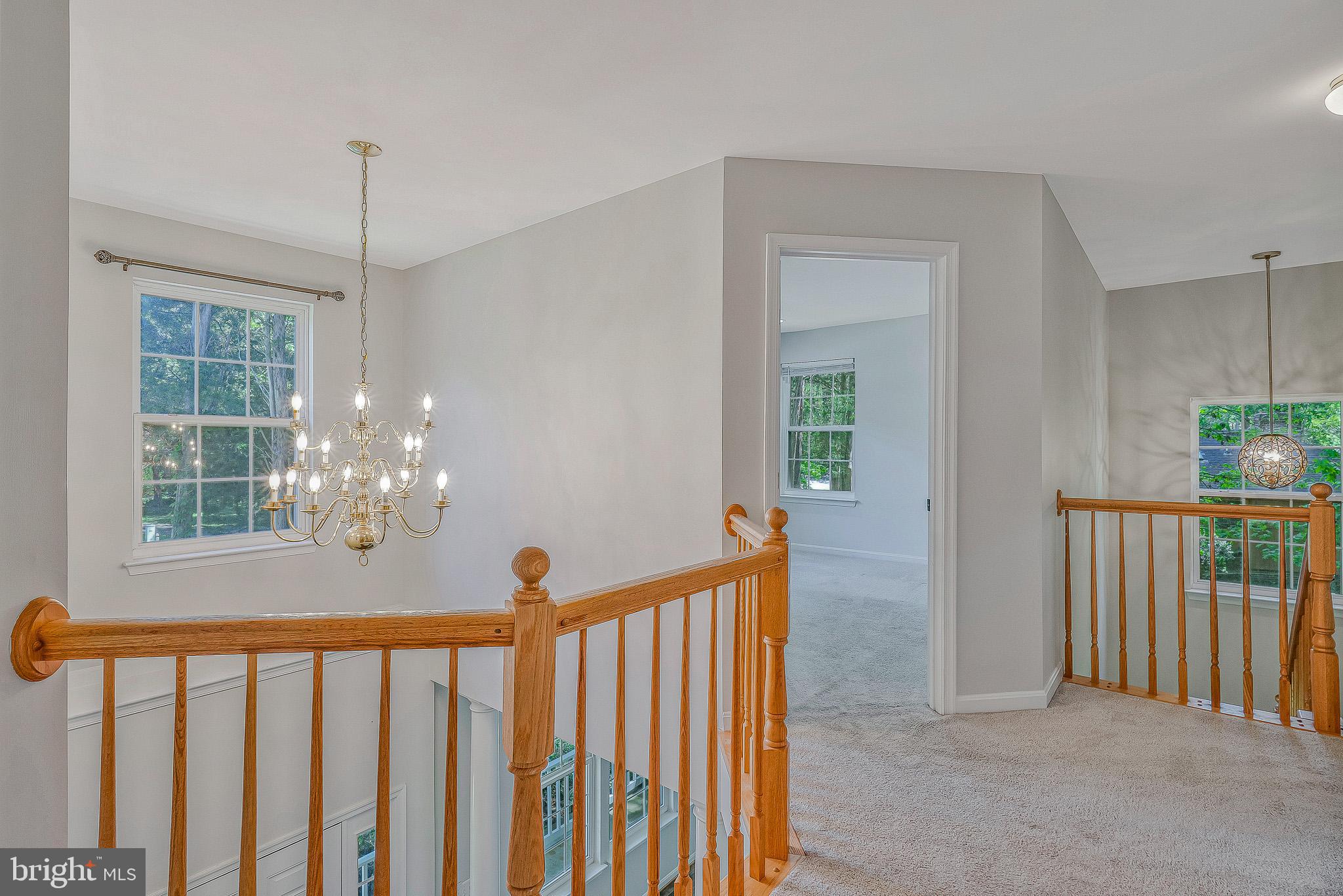 11587 Wollaston Circle Swan Point, MD 20645 - Photo 19 of 55 a view of a balcony and dining room