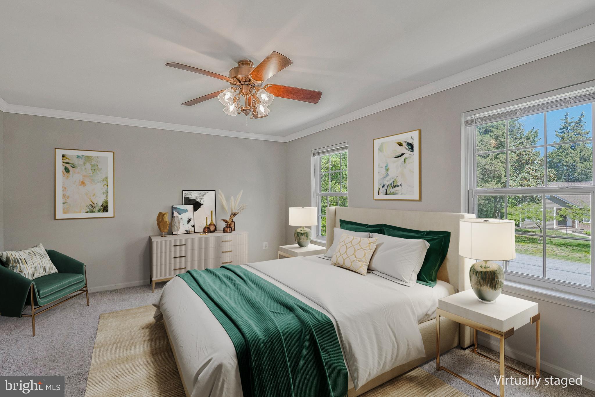 11587 Wollaston Circle Swan Point, MD 20645 - Photo 20 of 55 a bedroom with a bed and a chandelier