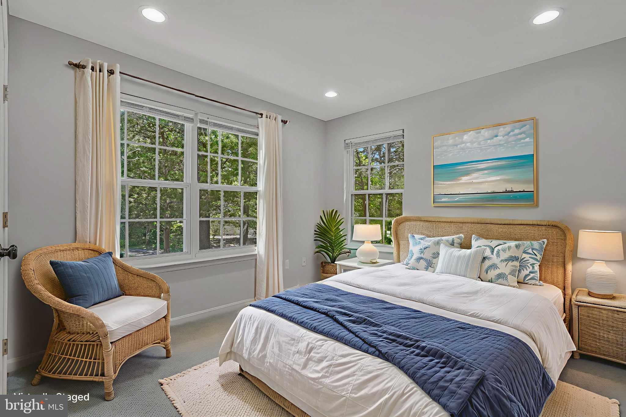 11587 Wollaston Circle Swan Point, MD 20645 - Photo 26 of 55 a bedroom with a bed and a couch