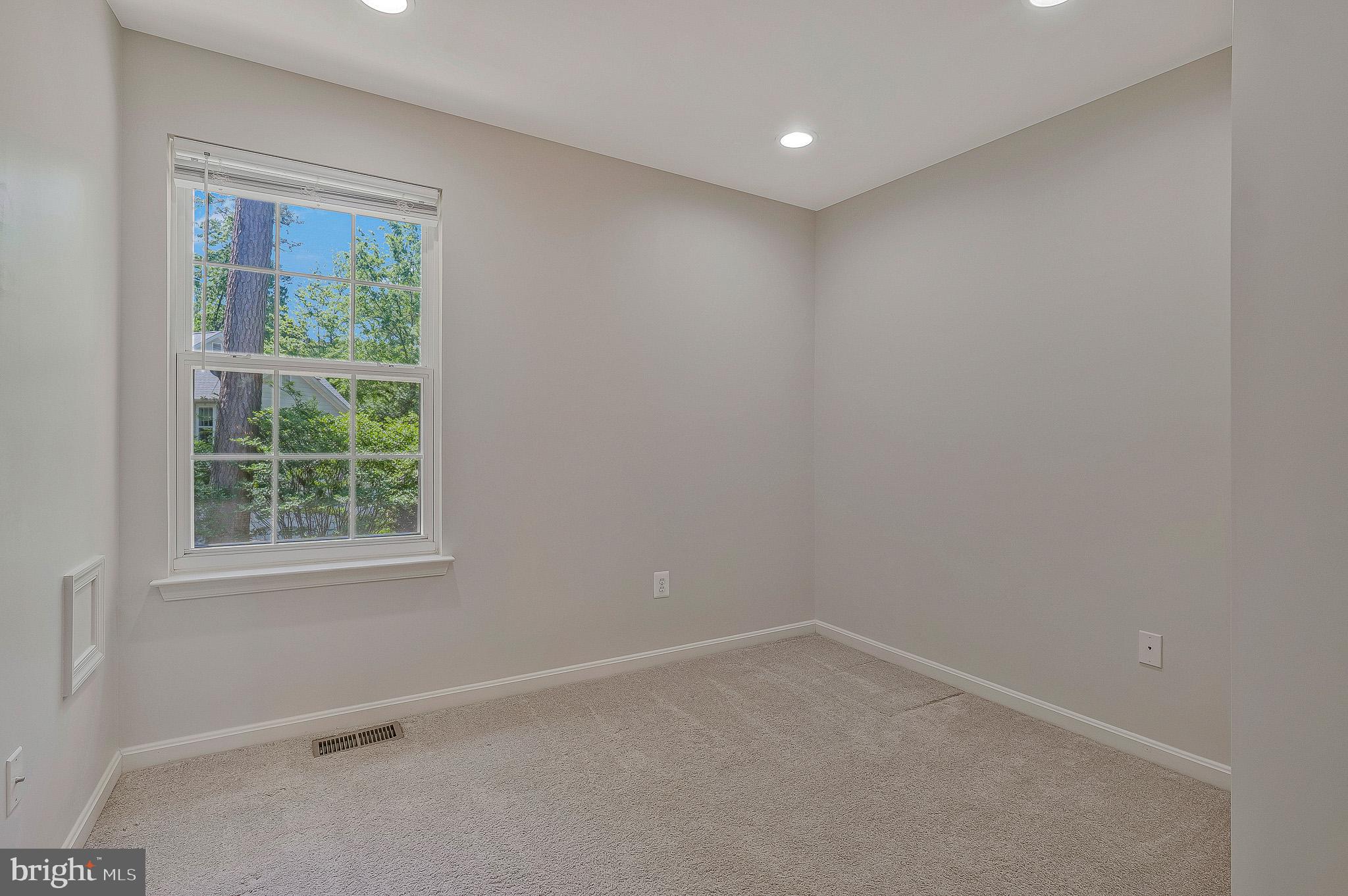 11587 Wollaston Circle Swan Point, MD 20645 - Photo 34 of 55 an empty room with a window