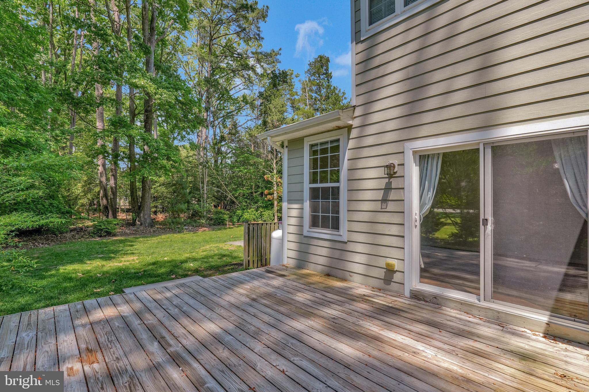 11587 Wollaston Circle Swan Point, MD 20645 - Photo 37 of 55 a view of a house with backyard and garden
