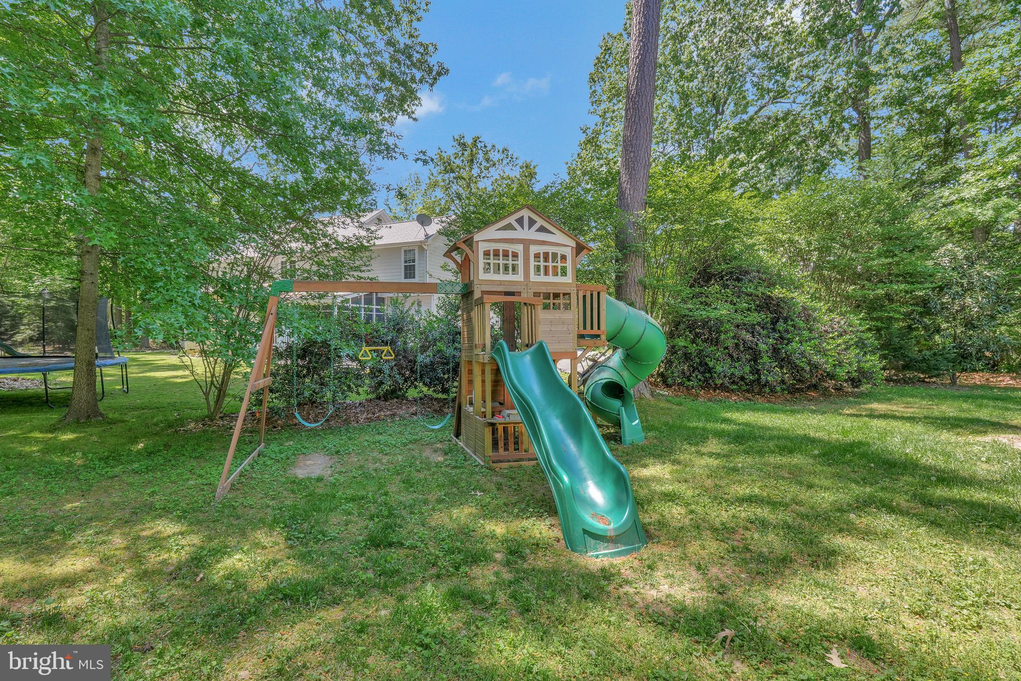 11587 Wollaston Circle Swan Point, MD 20645 - Photo 40 of 55 a view of a park with a slide