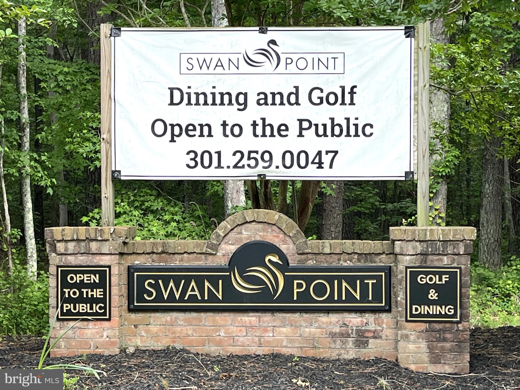 11587 Wollaston Circle Swan Point, MD 20645 - Photo 42 of 55 a view of sign board with a sign board