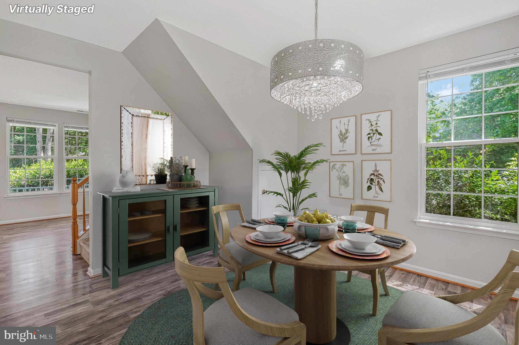 11587 Wollaston Circle Swan Point, MD 20645 - Photo 6 of 55 a view of a dining room with furniture window and outside view