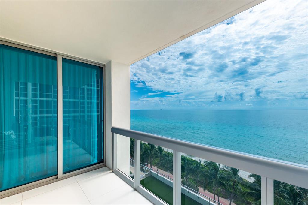 6899 Collins Avenue, Unit 908 Miami Beach, FL 33141 - Photo 1 of 19 a view of a balcony with an ocean view
