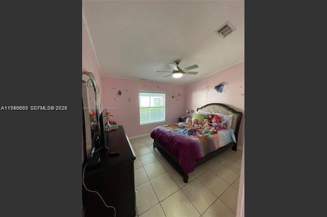 19800 Southwest 180th Avenue Miami, FL 33187 - Photo 7 of 9 a living room with furniture and a chandelier