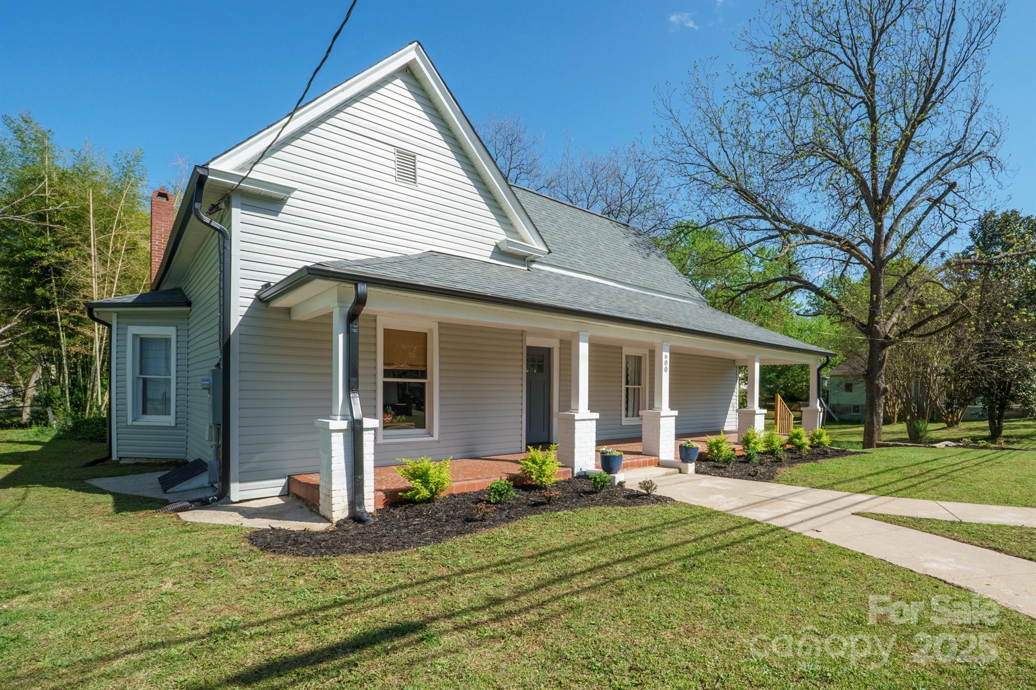 600 3rd Street Spencer, NC 28159 - Photo 1 of 27 a front view of house with yard and green space