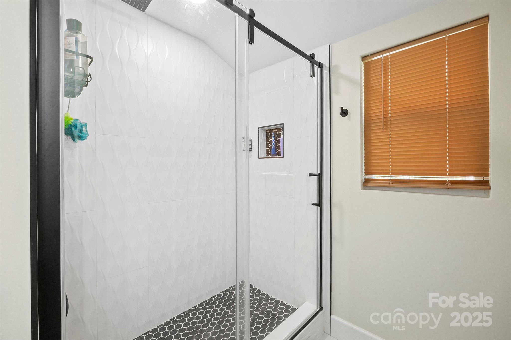 600 3rd Street Spencer, NC 28159 - Photo 19 of 27 a bathroom with a shower