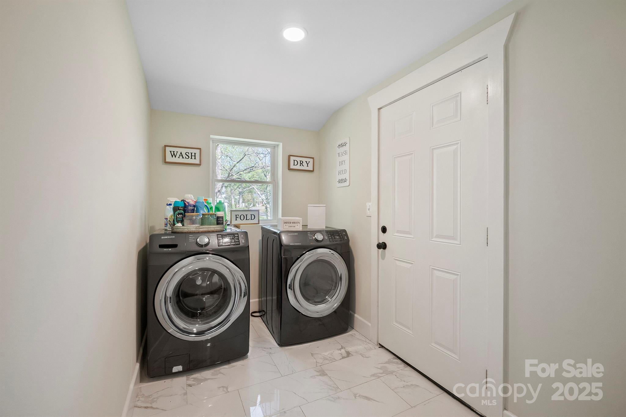 600 3rd Street Spencer, NC 28159 - Photo 25 of 27 a utility room with dryer and washer
