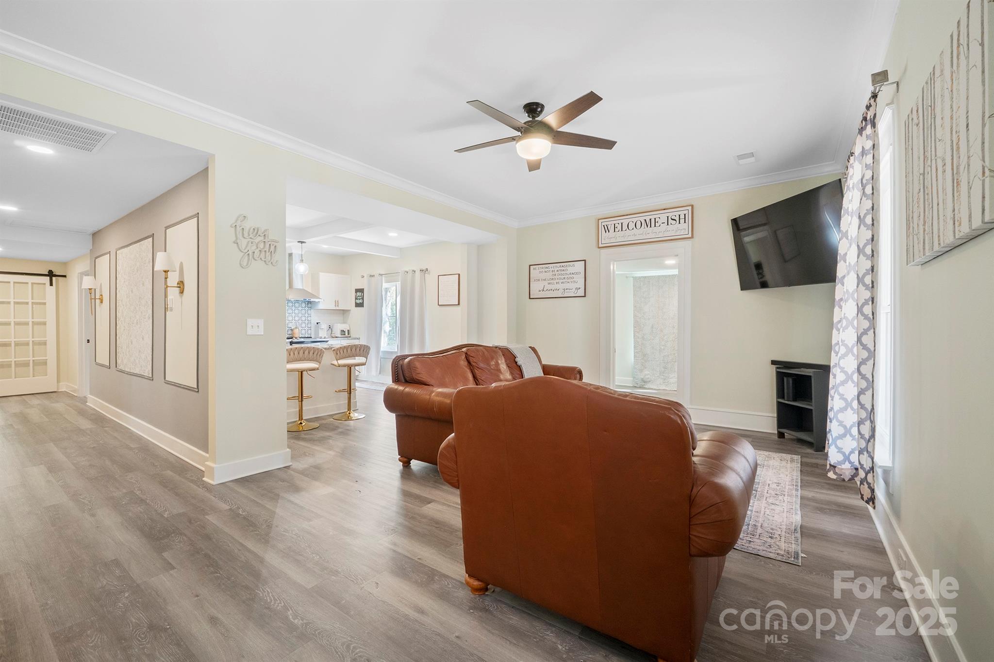 600 3rd Street Spencer, NC 28159 - Photo 7 of 27 a living room with furniture and a flat screen tv