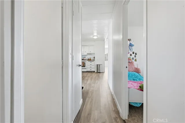 a kitchen with stainless steel appliances a refrigerator sink and cabinets