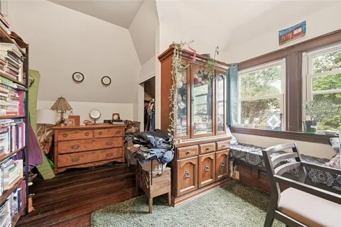 a room with furniture and a window