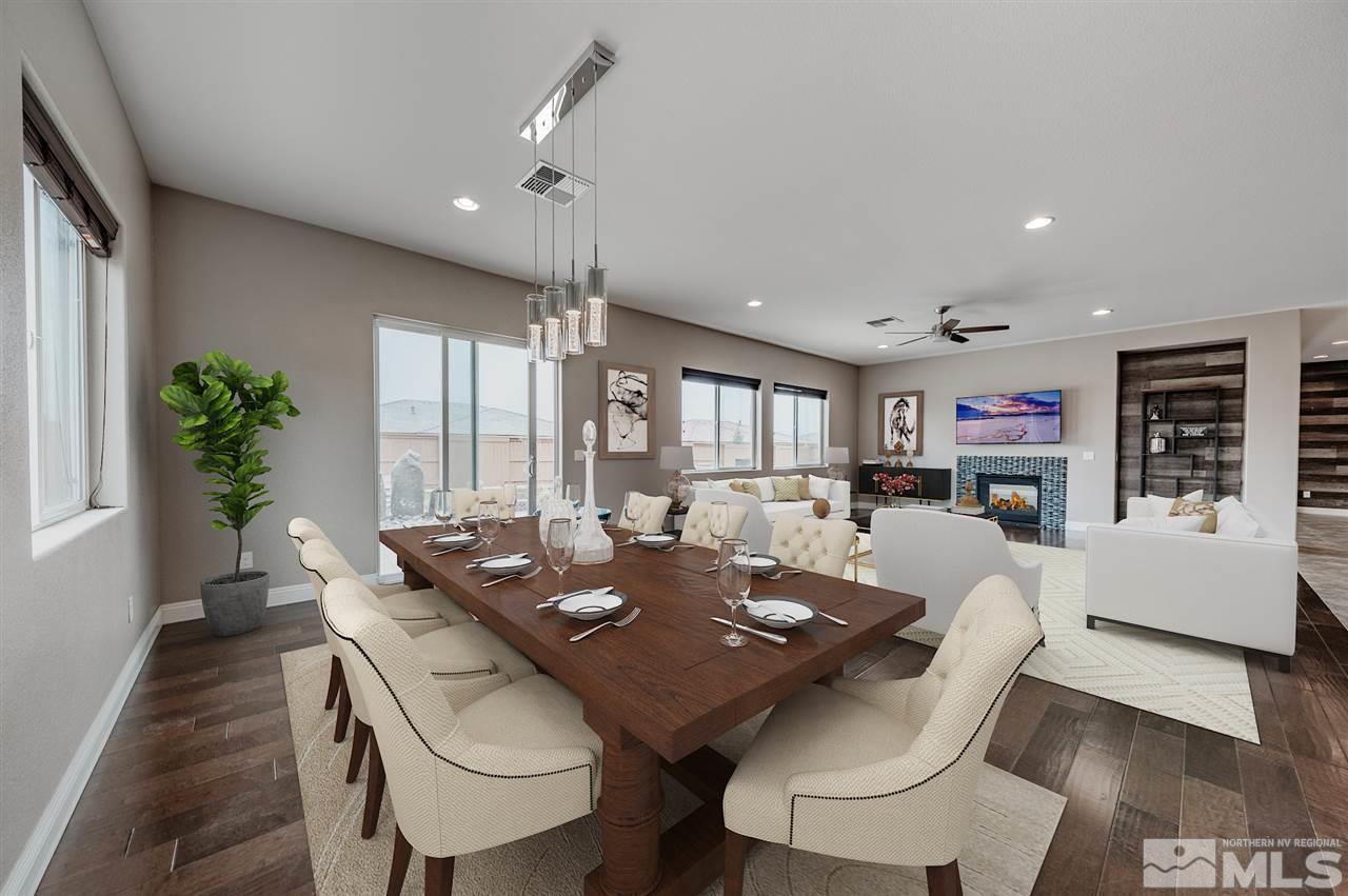 9875 Firefoot Lane Reno, NV 89521 - Photo 15 of 29 a view of a dining room with furniture window and wooden floor