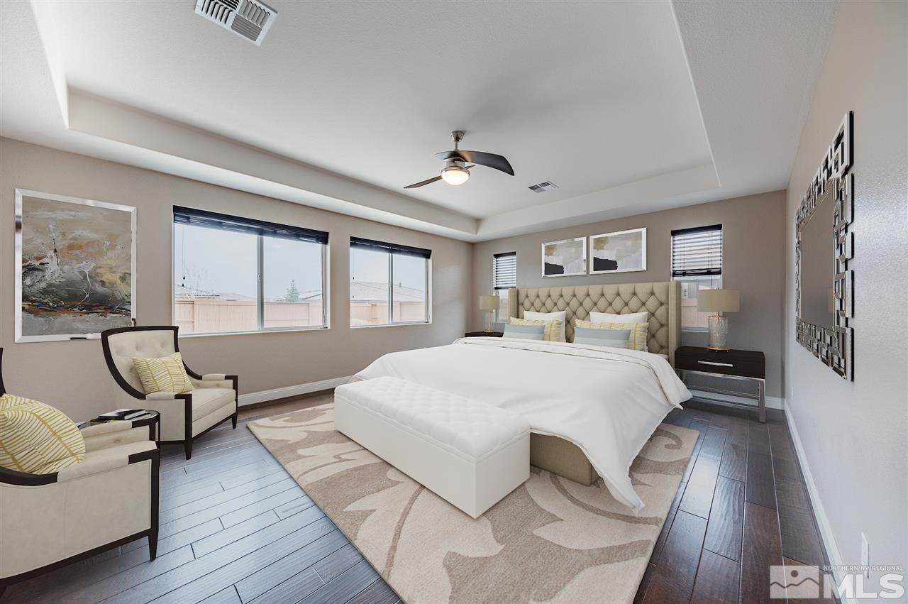 9875 Firefoot Lane Reno, NV 89521 - Photo 16 of 29 a bedroom with a bed wooden floor and window