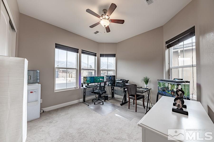 9875 Firefoot Lane Reno, NV 89521 - Photo 20 of 29 a view of a livingroom with furniture and a window