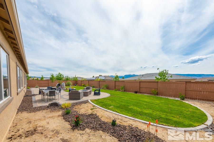 9875 Firefoot Lane Reno, NV 89521 - Photo 24 of 29 a view of a backyard with sitting area