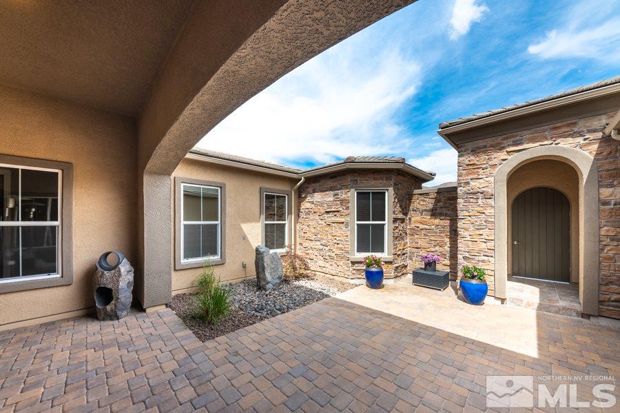 9875 Firefoot Lane Reno, NV 89521 - Photo 3 of 29 a view of a house with outdoor space and porch