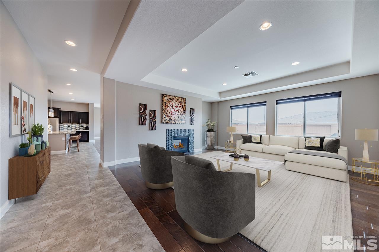 9875 Firefoot Lane Reno, NV 89521 - Photo 7 of 29 a living room with couches and kitchen view with wooden floor