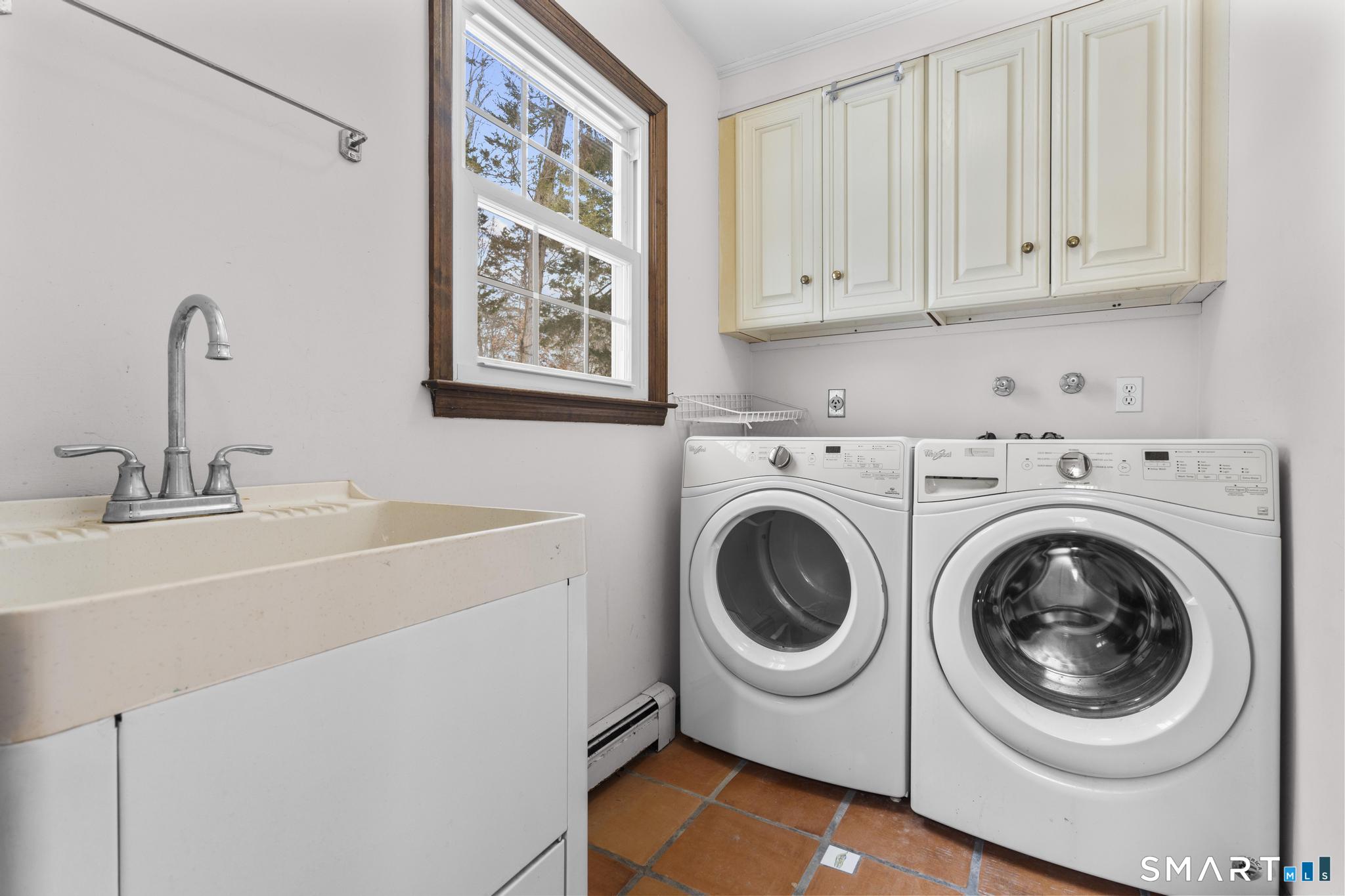 4 Twist Hill Road Newtown, CT 06470 - Photo 13 of 40 a utility room with dryer and washer