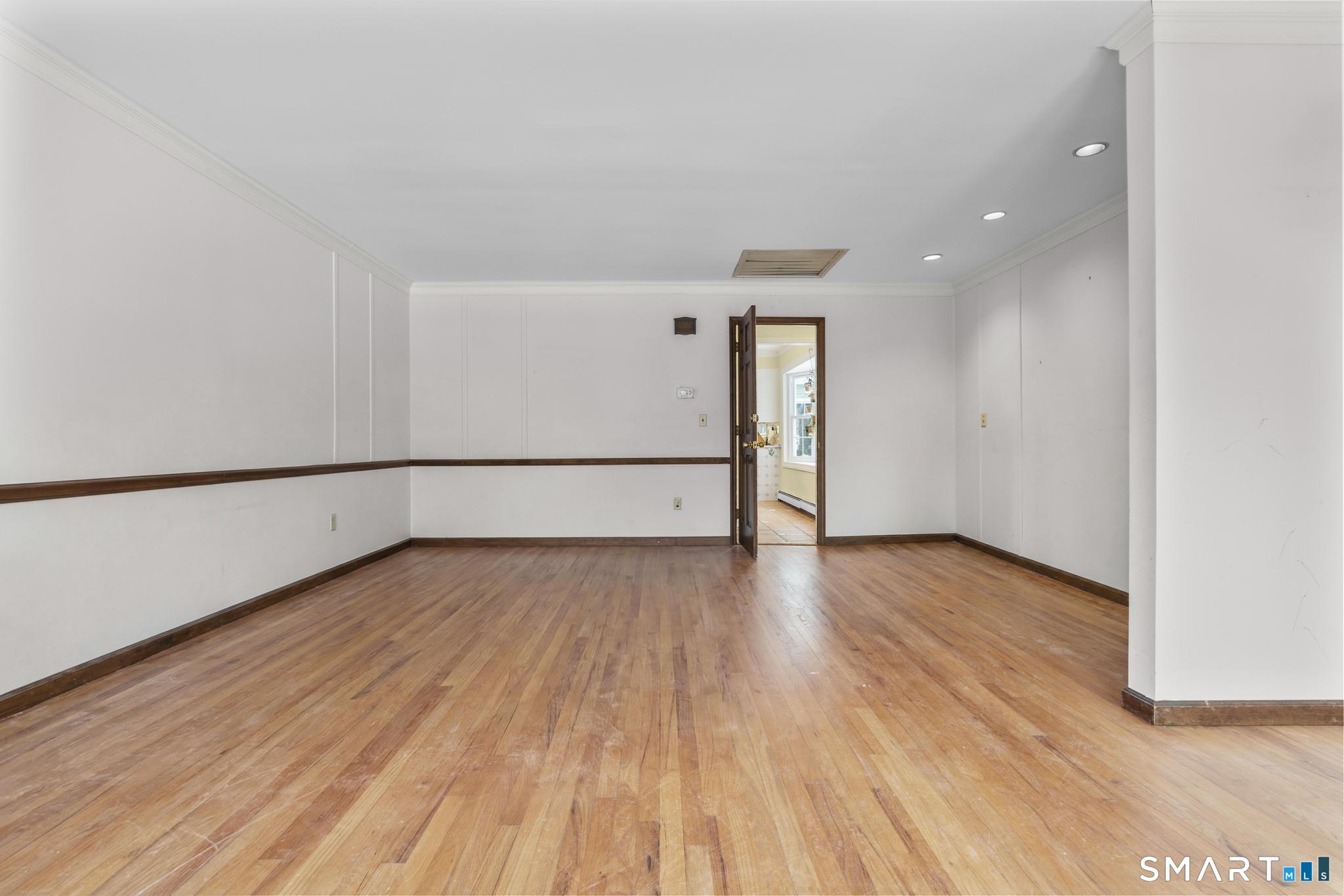 4 Twist Hill Road Newtown, CT 06470 - Photo 15 of 40 a view of an empty room with wooden floor