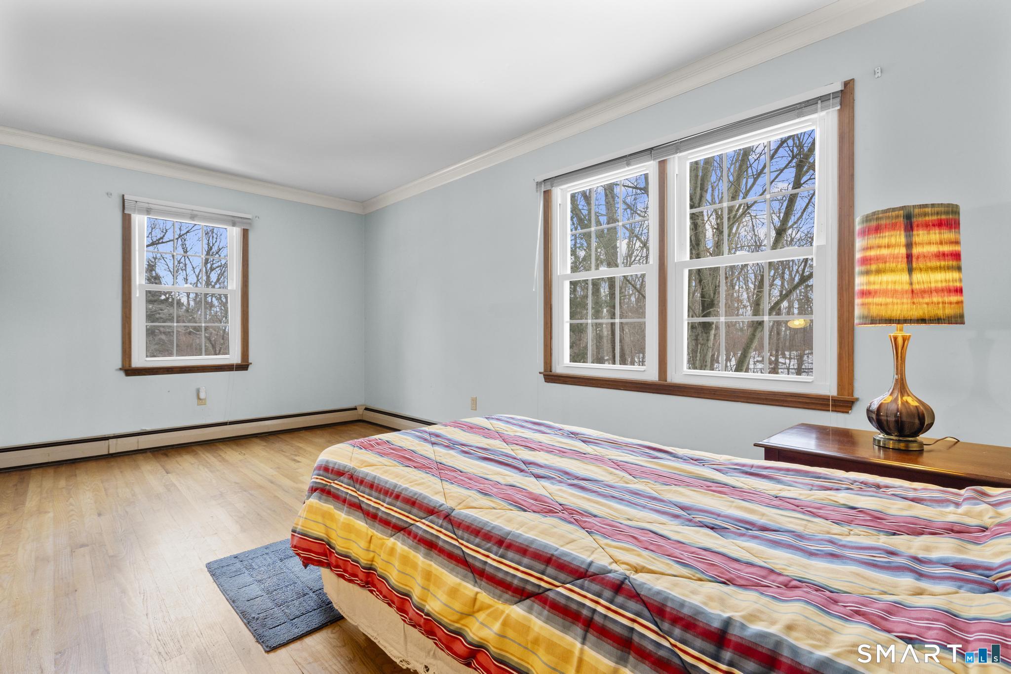 4 Twist Hill Road Newtown, CT 06470 - Photo 18 of 40 a bedroom with bed and a window