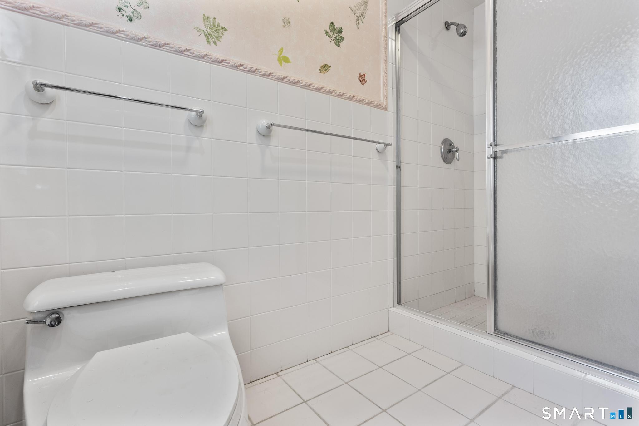 4 Twist Hill Road Newtown, CT 06470 - Photo 30 of 40 a bathroom with a toilet and a shower