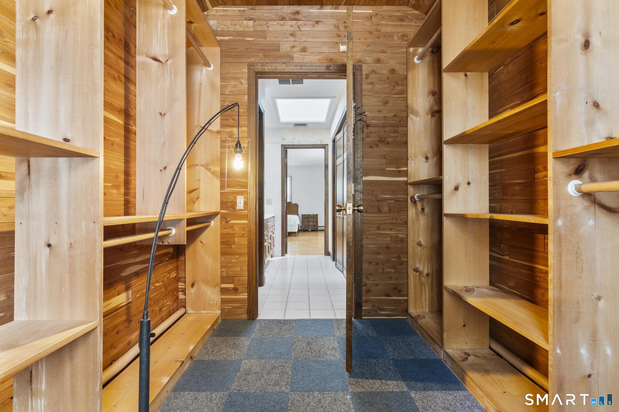 4 Twist Hill Road Newtown, CT 06470 - Photo 32 of 40 a view of a hallway with wooden floor and staircase