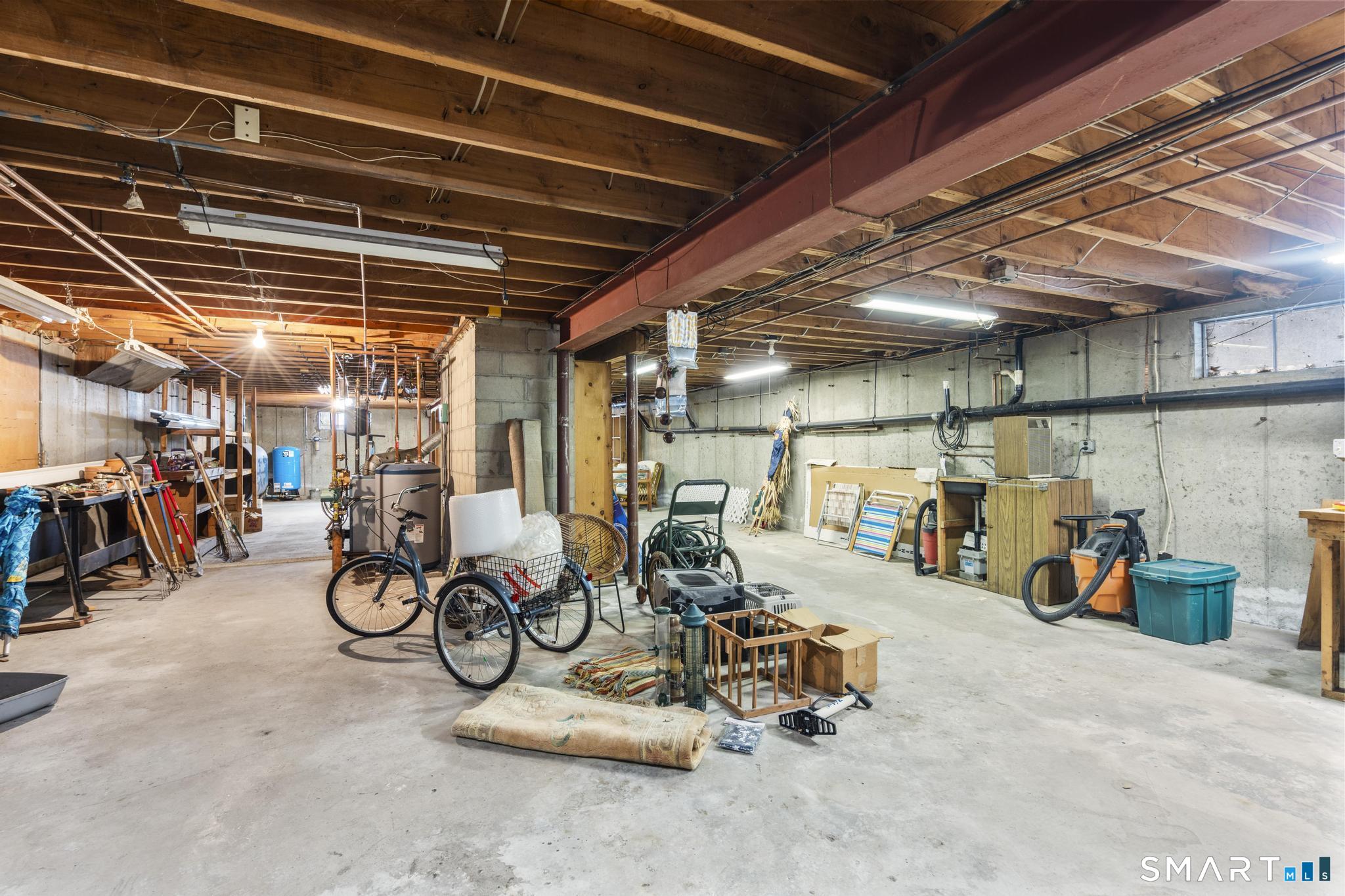 4 Twist Hill Road Newtown, CT 06470 - Photo 33 of 40 a view of a storage with bicycles