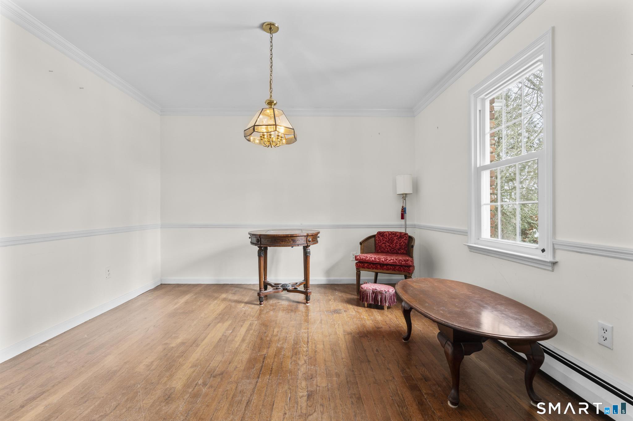 4 Twist Hill Road Newtown, CT 06470 - Photo 6 of 40 a room with furniture and window