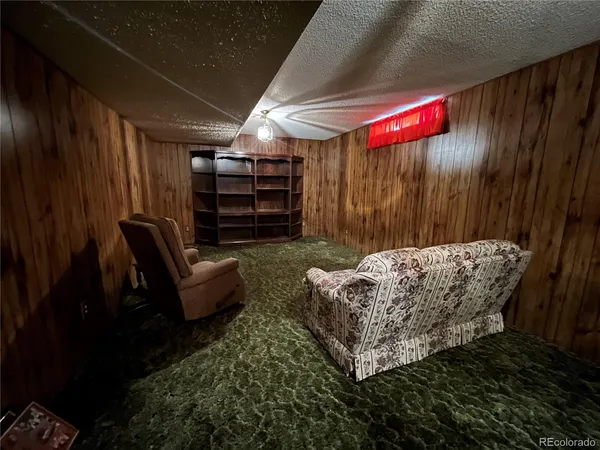 a bed room with a bed and a couch