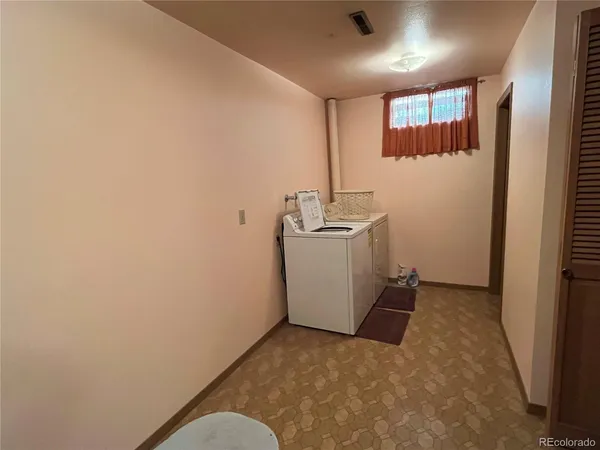 a view of a hallway with storage
