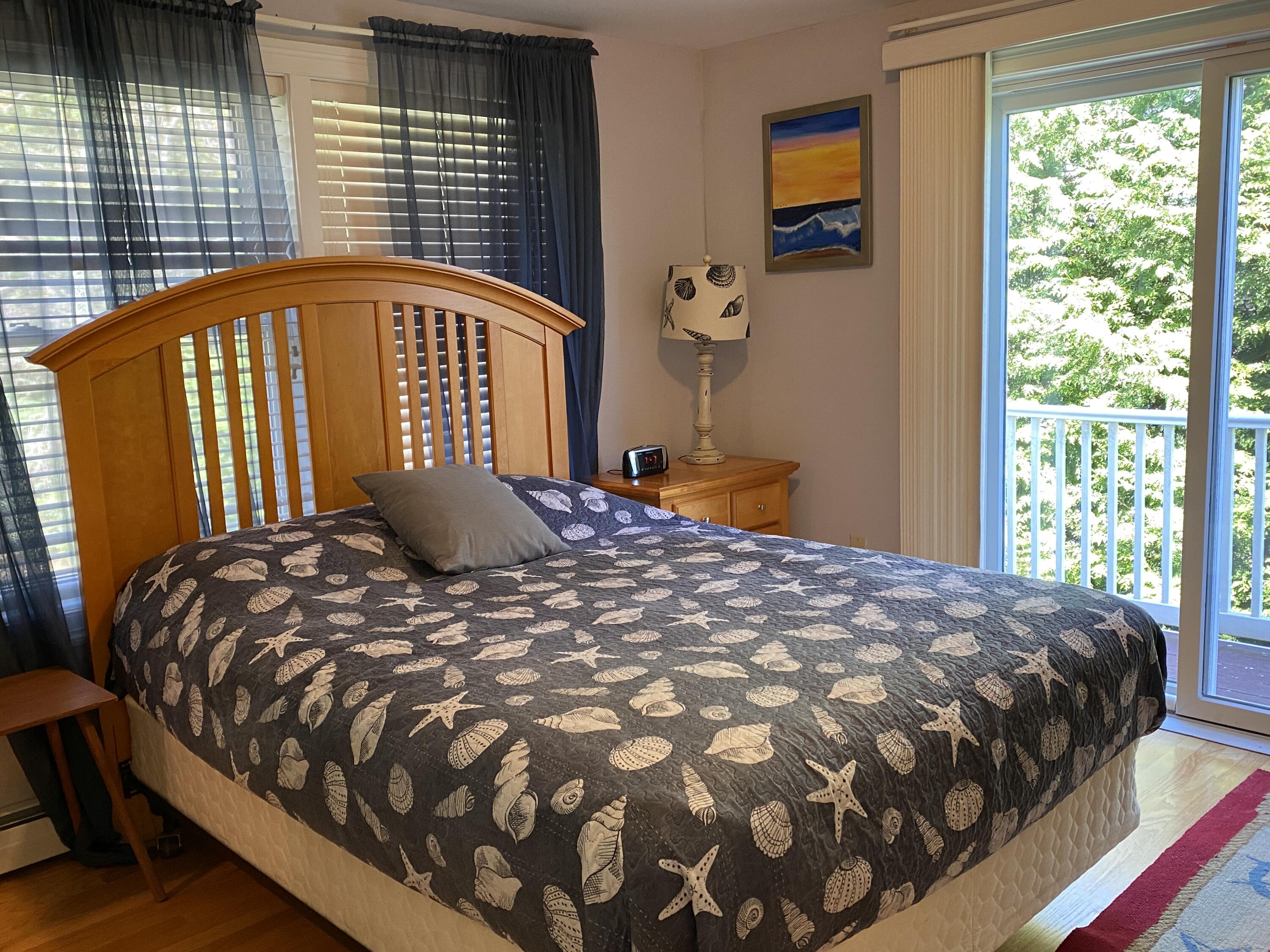 25 Ripple Cove Road Hyannis, MA 02601 - Photo 16 of 38 a bedroom with a bed and window