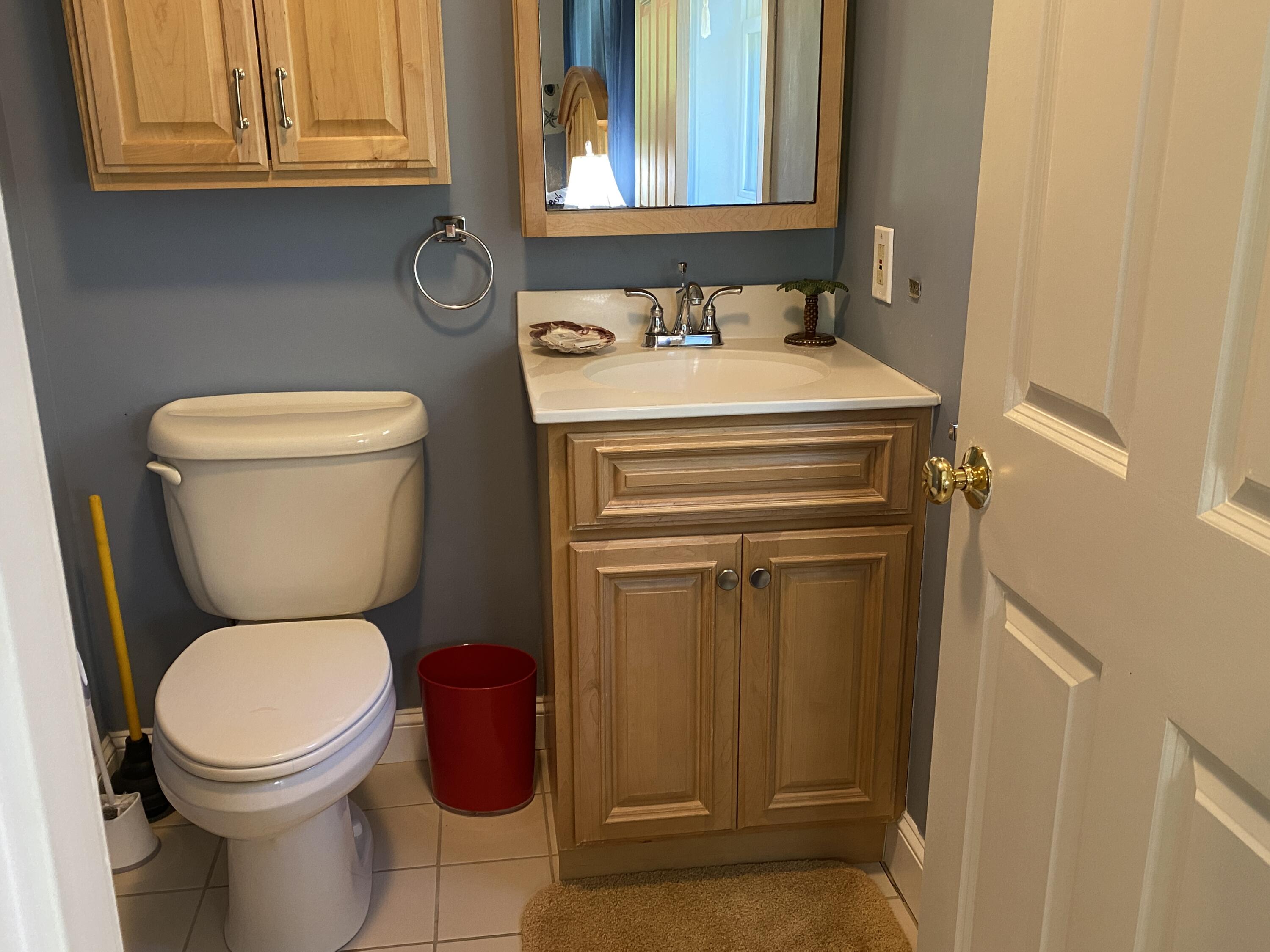 25 Ripple Cove Road Hyannis, MA 02601 - Photo 19 of 38 a bathroom with a toilet and a sink