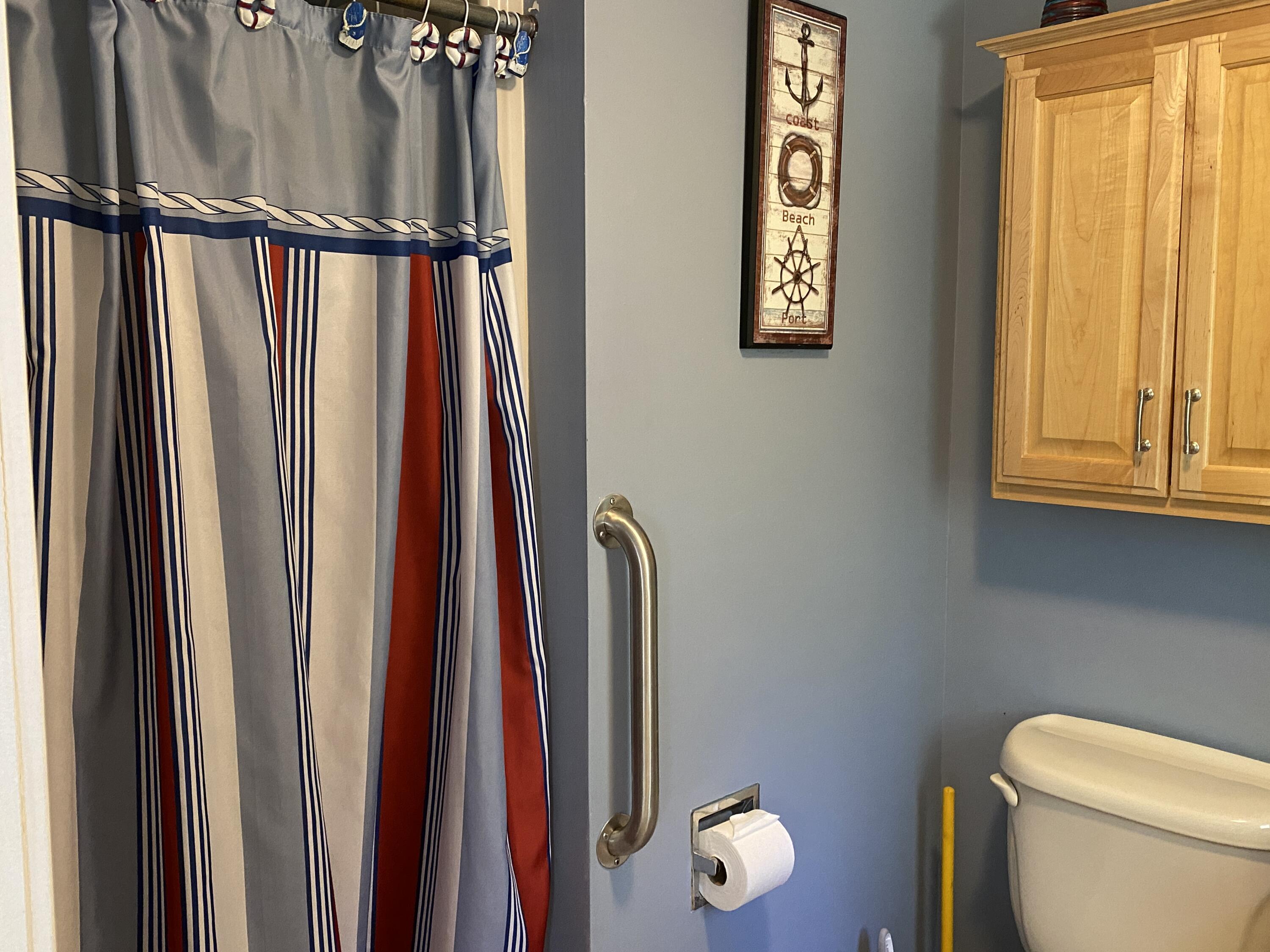 25 Ripple Cove Road Hyannis, MA 02601 - Photo 20 of 38 a view of a bathroom with a toilet and a window